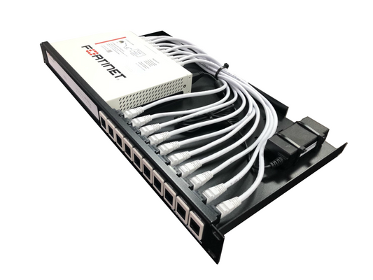 Network switch with multiple Ethernet cables plugged in on a white background